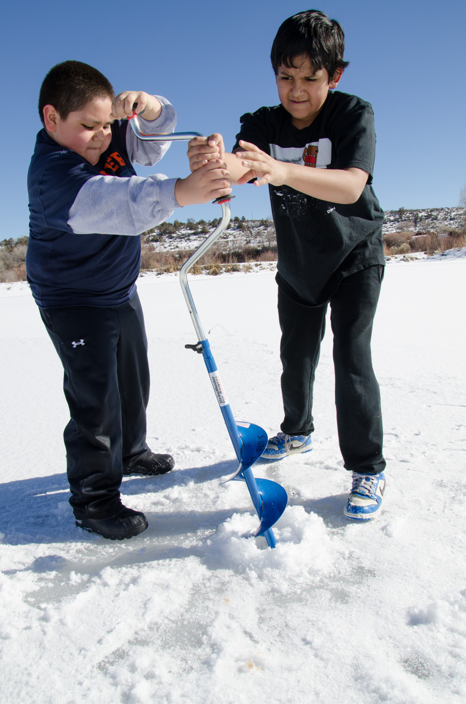 Nathaniel Howe and Jawadin Corona team up on the hand auger.