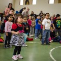 Thumbnail image of Kids stand in awe and delight at the sight of Smokey Bear himself