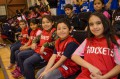 Thumbnail image of Boys and girls of various ages were decked out Friday, Feb. 8 in their teams’ respective jerseys