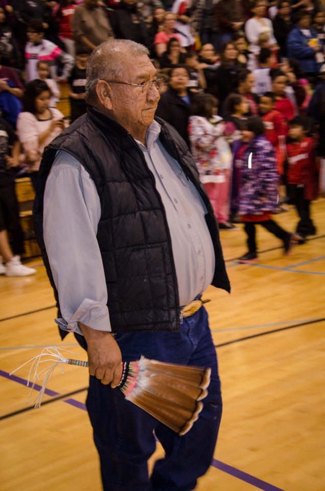 Southern Ute tribal elder Elwood Kent makes his way to the drum to perform a traditional blessing following the formal announcement of teams.