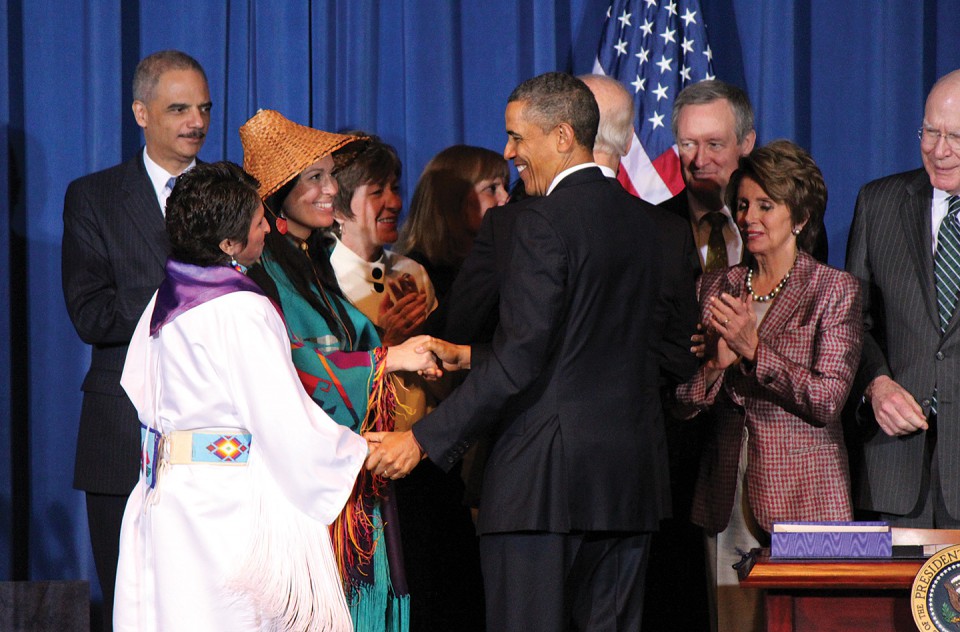 Southern Ute tribal member Diane Millich greets President Obama