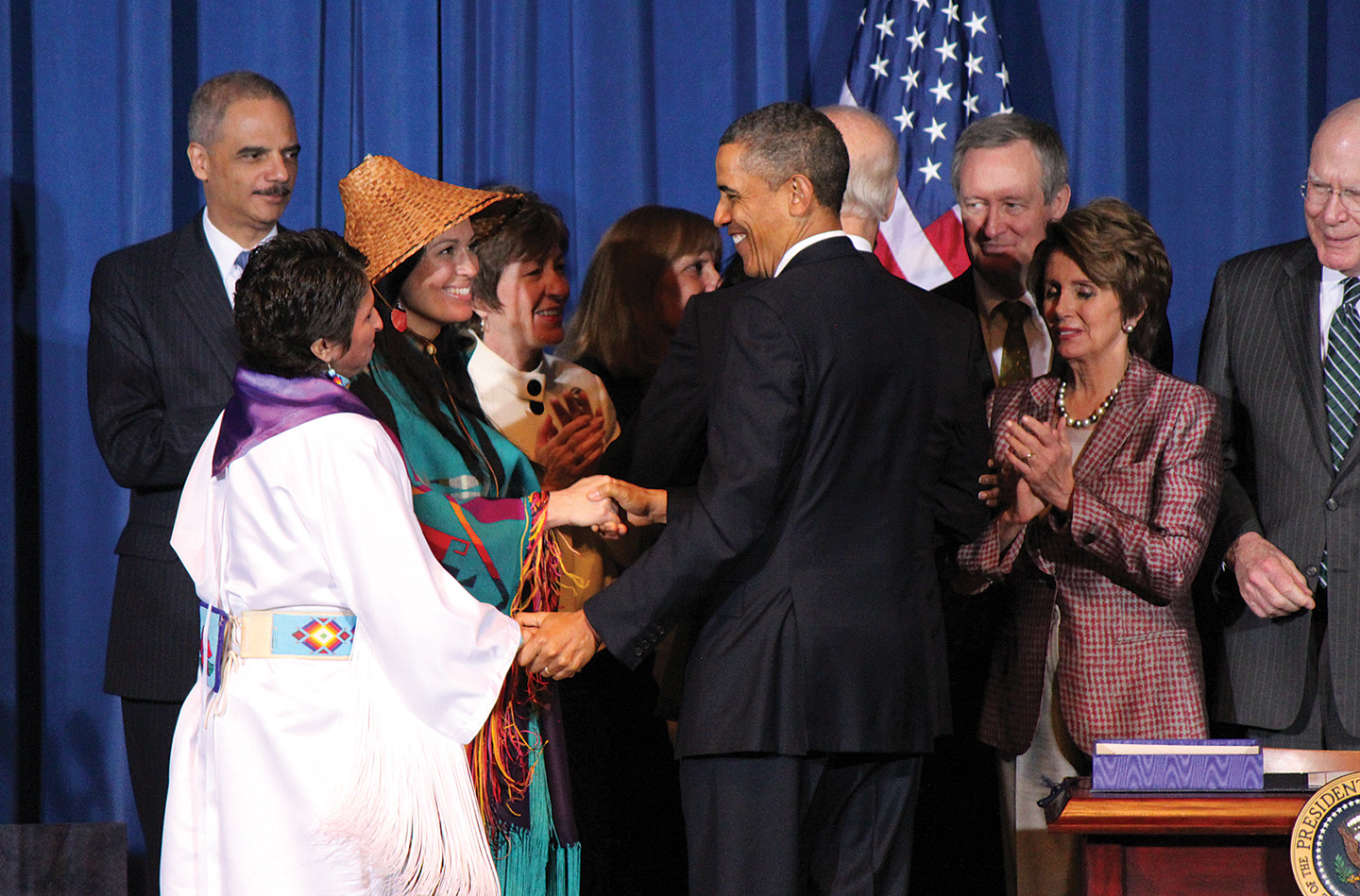 Southern Ute tribal member Diane Millich greets President Obama