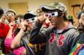 Thumbnail image of Participants view photographs in 3D using special glasses.