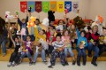 Thumbnail image of Kids and bears converge in the Ignacio Elementary School for a class photo on Friday, Dec. 21.