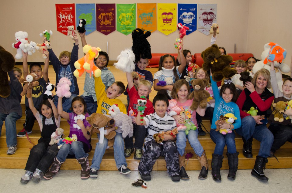 Kids and bears converge in the Ignacio Elementary School for a class photo on Friday, Dec. 21.