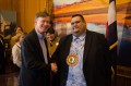 Thumbnail image of Colorado Gov. John Hickenlooper and Southern Ute Chairman Jimmy R. Newton Jr. shake hands following the signing of HB 13-1198 on Friday, March 22