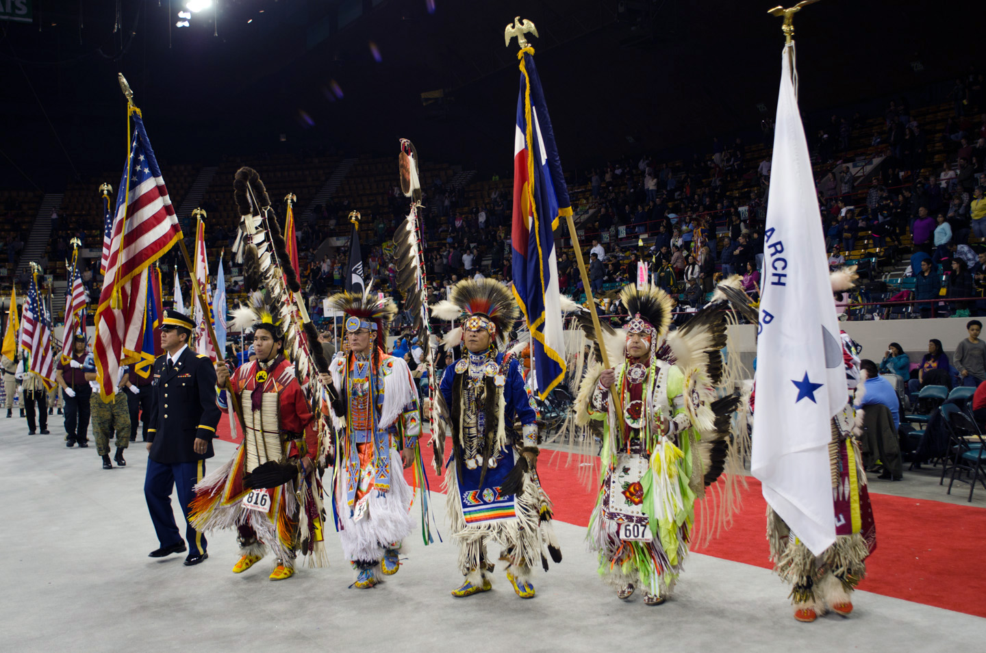 Head Dancers lead the way for the 39th annual Denver March Powwow.