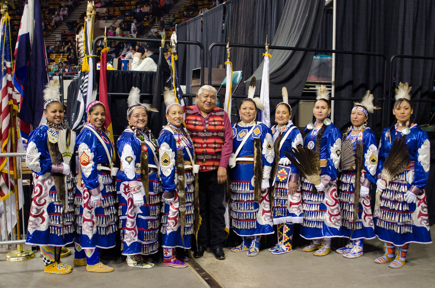 Southern Ute elder Kenny Frost stands for a portrait with the Native American Women Warrior group