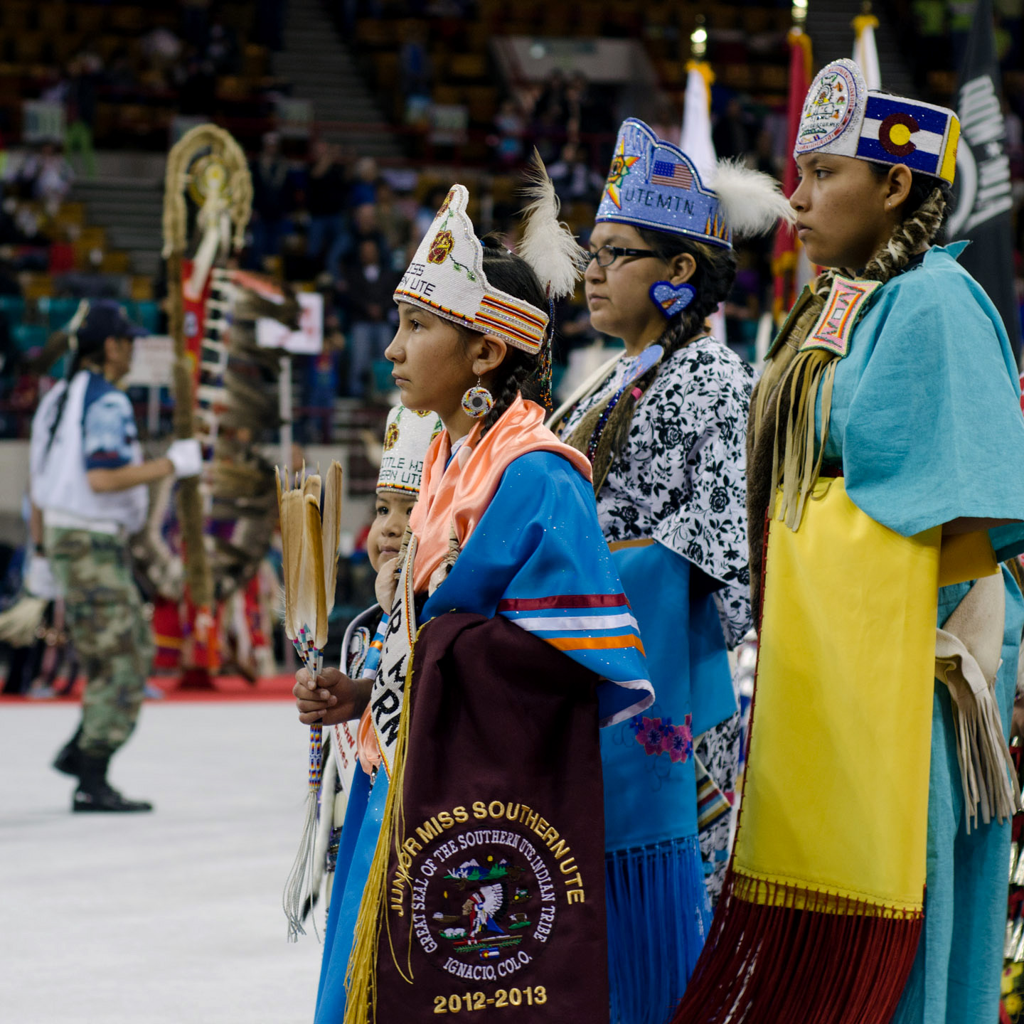 Jasmine Carmenoros and Tauri Raines proudly represent the tribe as royalty from across Indian Country make a circle through the arena