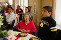 Thumbnail image of Kristi Garnanez, Irene Burch and others from the family and community recognized the bravery of young Ethan Rock during the Breakfast of Champions.