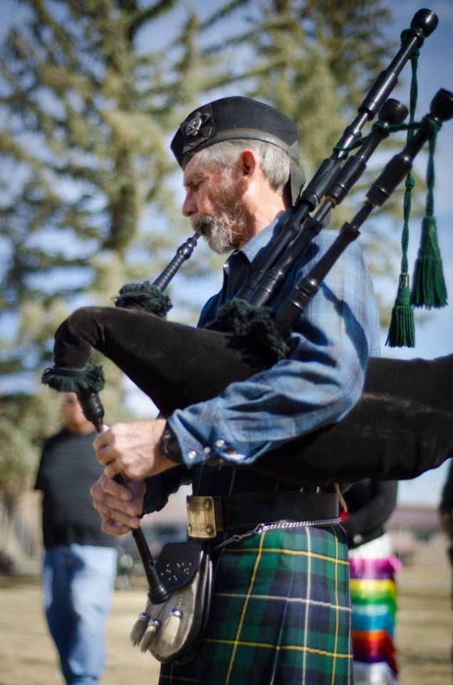 Veteran Jim Lynch of Cortez pays respect with his bagpipes, filling the morning air with crisp music.