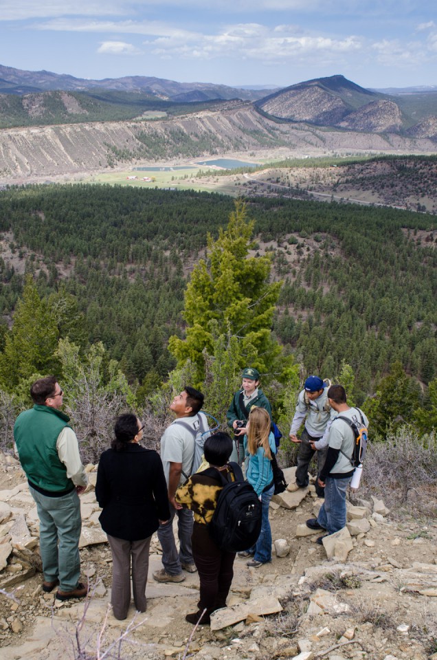 Taking in the expansive view, Southwest Conservation Corps representatives and U.S. Forest Service officials stand with Jodi Gillette