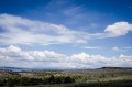 Thumbnail image of Views across Southern Ute range units yield stunning views of the La Platas, white with spring snow cover.