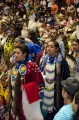 Thumbnail image of Southern Ute tribal member Marquetta Howe and her daughter, Izabella, take part in the grand entry.