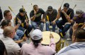 Thumbnail image of Yellow Jacket sings during the drum competition.