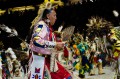 Thumbnail image of Dancers of all ages take part in the grand entry ceremony.