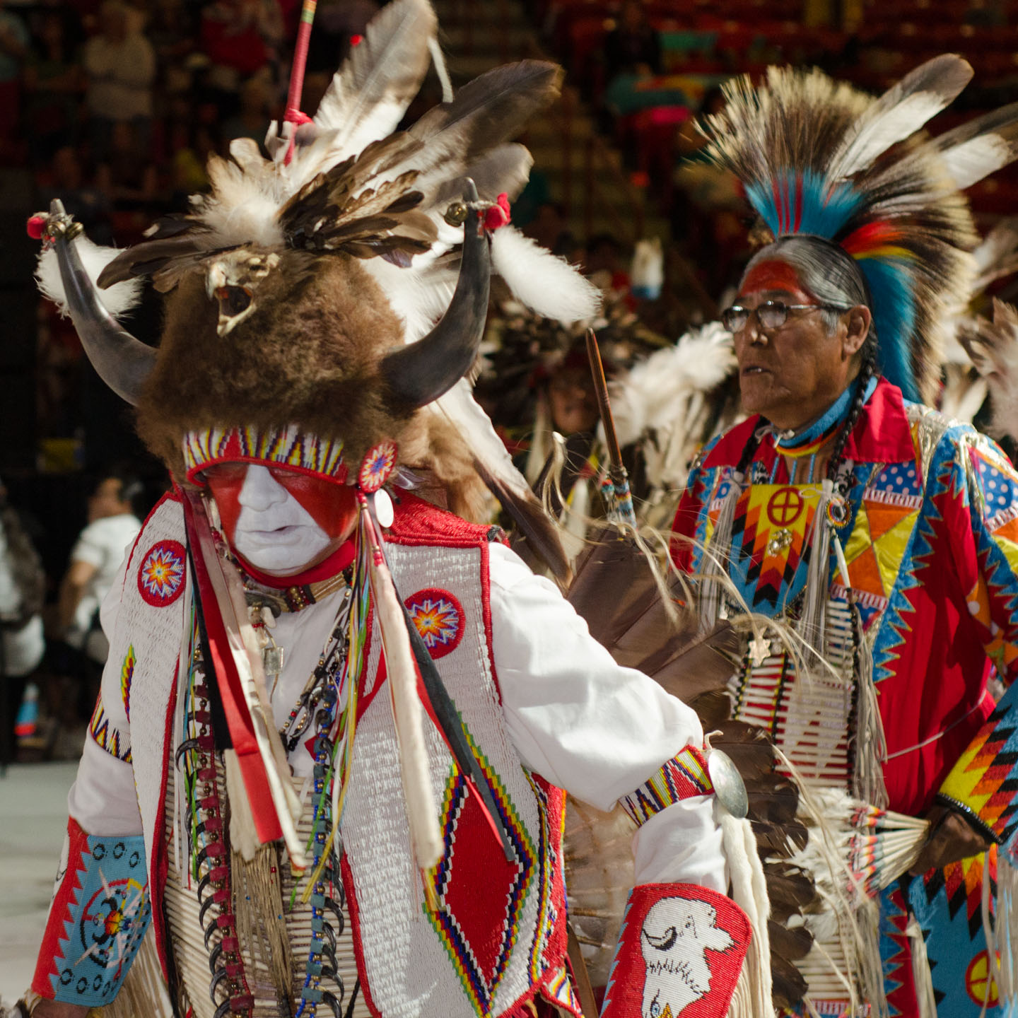 Traditional-style dancers lead the grand entry at the Gathering of Nations powwow.