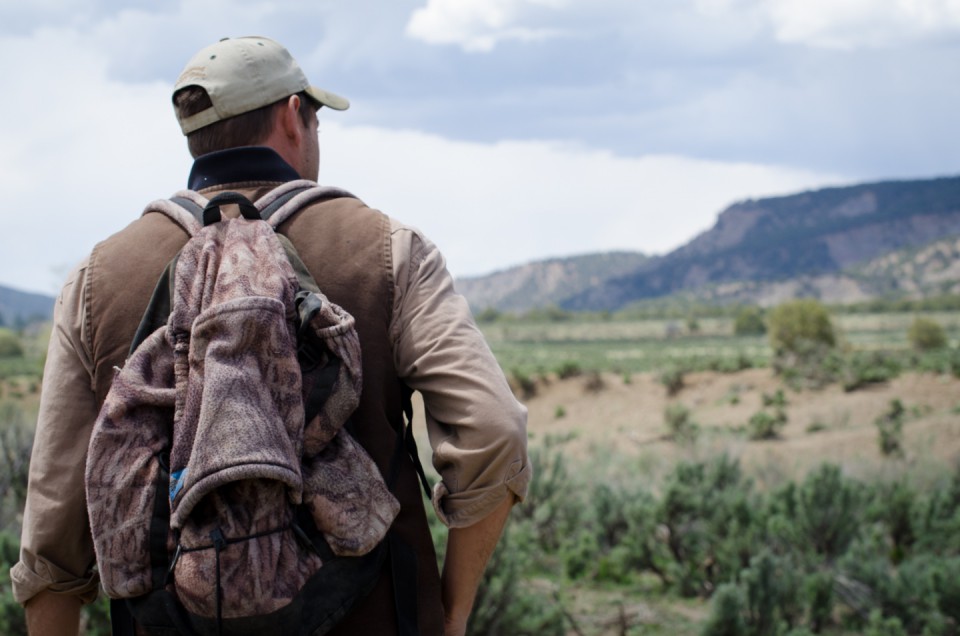 Southern Ute Range Technician Doug Krueger scans the horizon for feral horses who frequent the tribal range units on the reservation's east side.