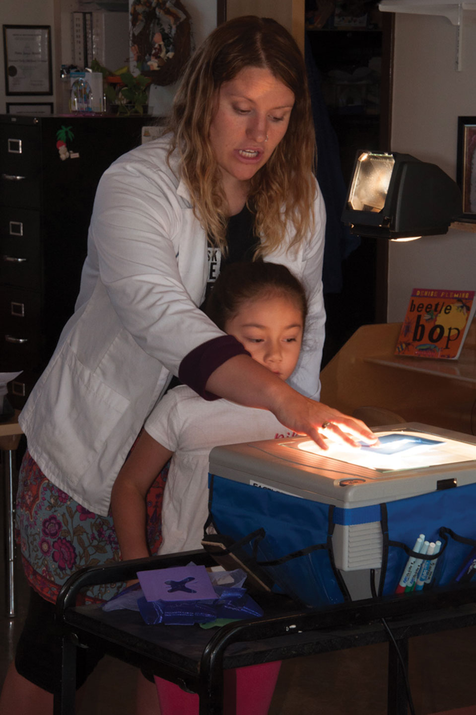 Hannah Hendrey of the Durango Discovery Museum demonstrates light, colors and objects