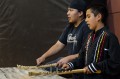 Thumbnail image of Bear Dance Sub Chief John Chavarillo sings Bear Dance songs alongside Jonas Nanaeto during a Bear Dance etiquette workshop at the SunUte Community Center for members of the Boys & Girls Club of the Southern Ute Indian Tribe on Wednesday, May 22.