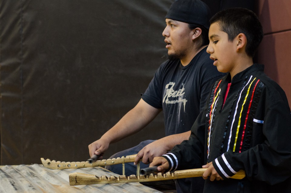 Bear Dance Sub Chief John Chavarillo sings Bear Dance songs alongside Jonas Nanaeto during a Bear Dance etiquette workshop at the SunUte Community Center for members of the Boys & Girls Club of the Southern Ute Indian Tribe on Wednesday, May 22.