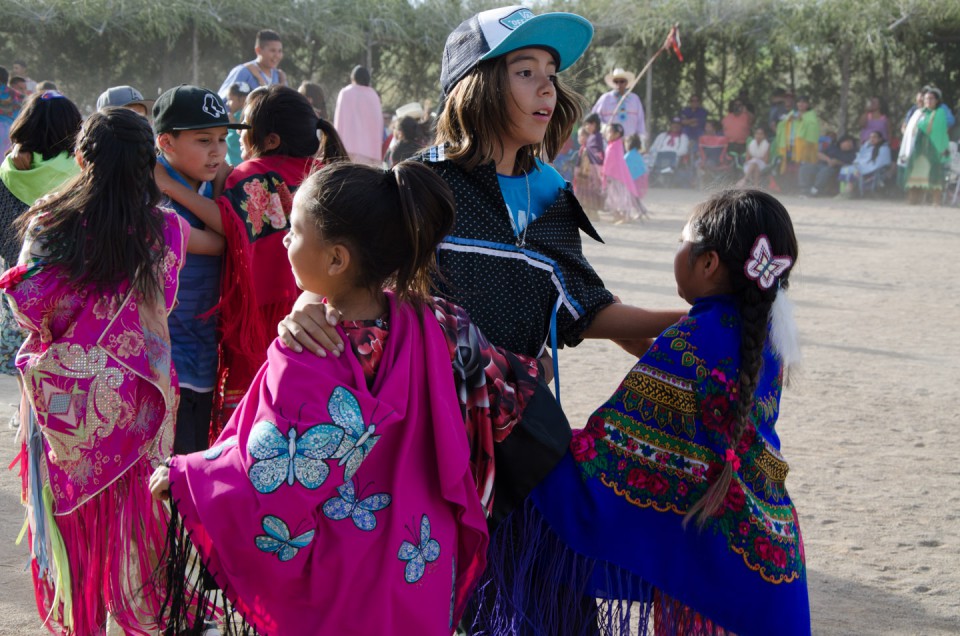 Young dancers pair up with their peers during the Bear Dance.