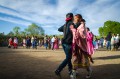 Thumbnail image of Southern Ute Bear Dancers Shoshone Thompson and Keifer Goodtracks-Alires break off on Monday, May 27 during the final hours the Bear Dance, a Ute springtime celebration spanning four days.