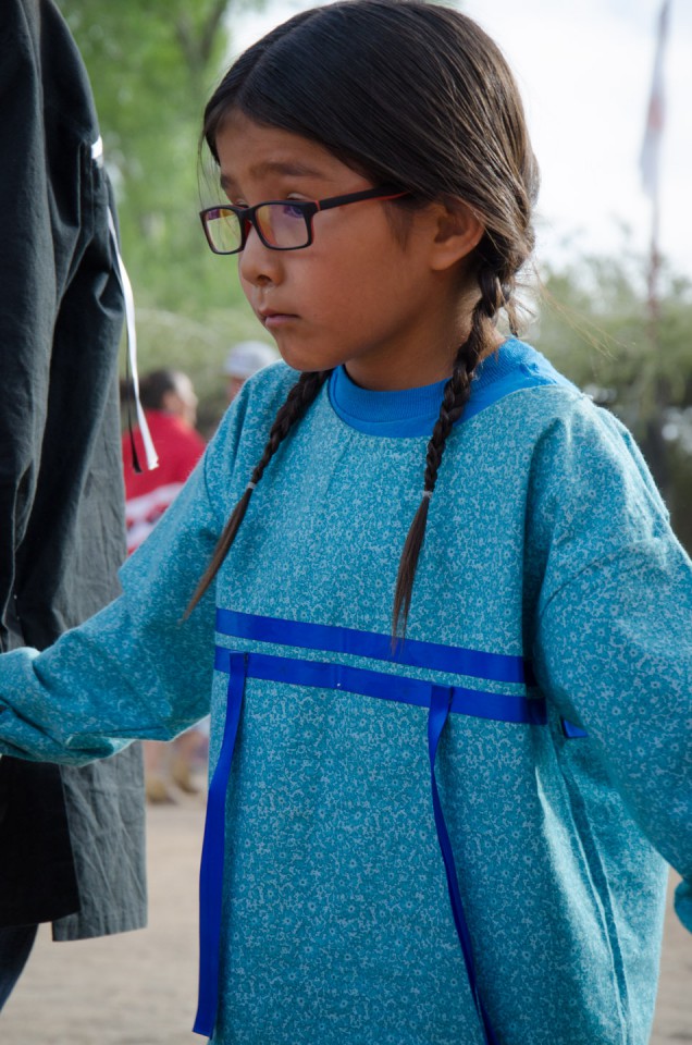A young Bear Dancer shows focus during the line dance.