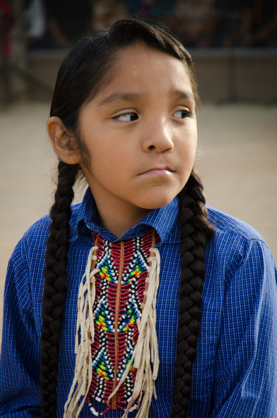 A young Bear Dancer in traditional clothing.