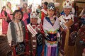 Thumbnail image of Southern Ute Brave Cyrus Naranjo, Little Miss Southern Ute Alternate Tauri Raines, Northern Colorado (Fort Collins) Intertribal Powwow Association Princess Avaleena Nanaeto and Jr. Miss Southern Ute Jazmin Carmenoros are all smiles prior to entering the powwow arena.
