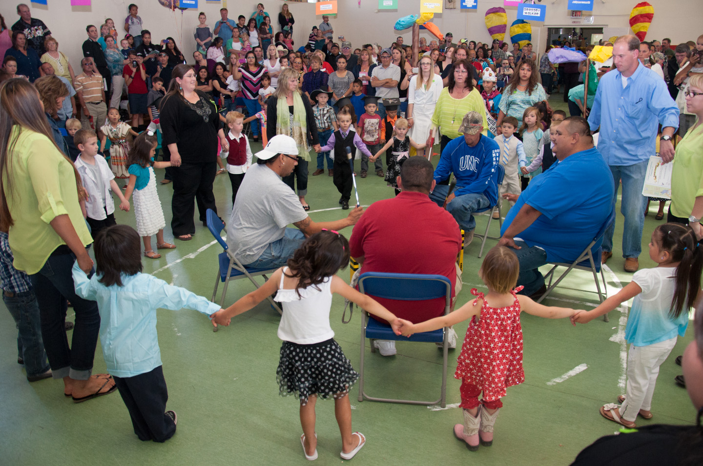 Hundreds of students, families and friends filled the gym at the Southern Ute Montessori Head Start building on Wednesday, May 29 to celebrate the graduating students. To close the ceremony, the students and their teachers performed a round dance together while local drum group Yellow Jacket sang.