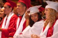 Thumbnail image of Michelle Simmons adjusts her tassel