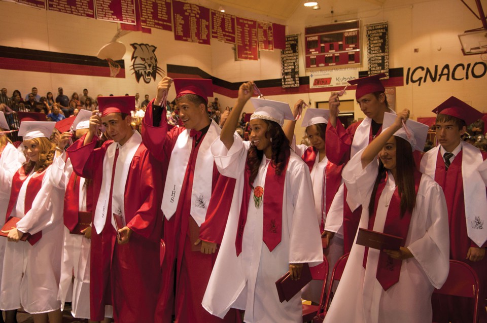 After pronounced graduates, students move their tassels