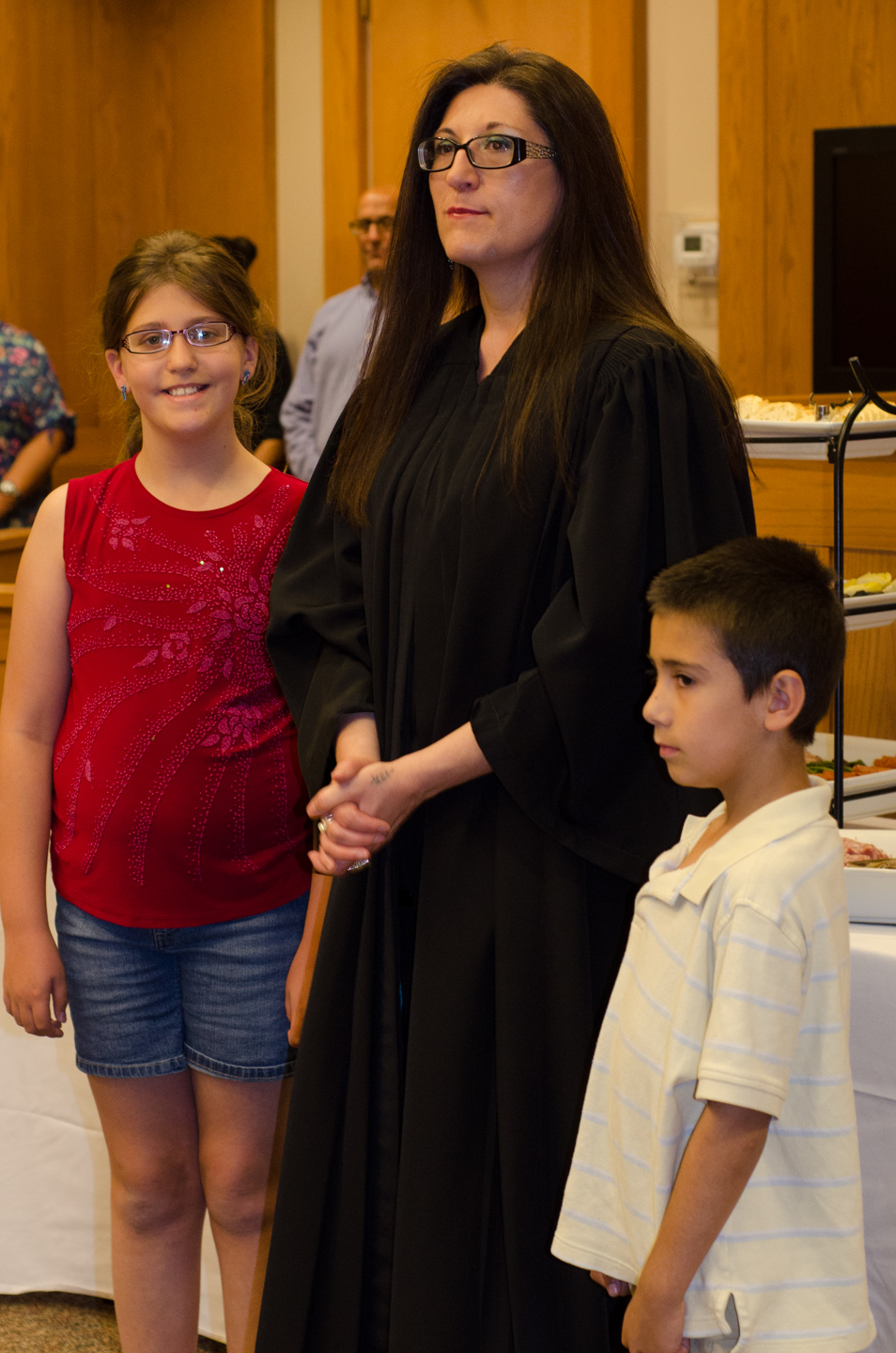 Judge Cloud stands with her family during the reception.