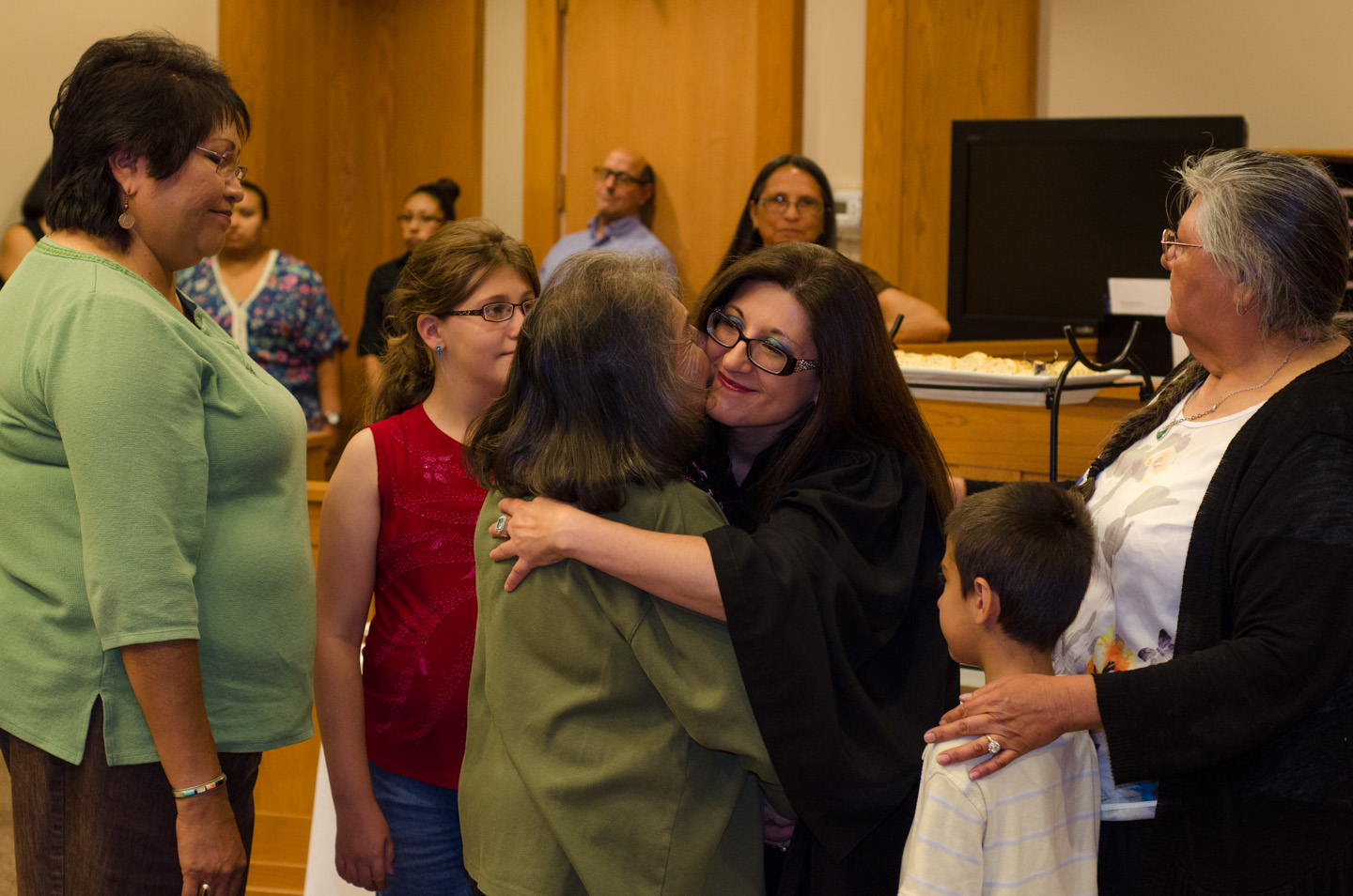 Judge Cloud greets community members following the swearing in.