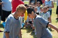 Thumbnail image of Field Day activities included a variety of relay races, which challenged students to get wet while holding onto squishy or slippery objects.