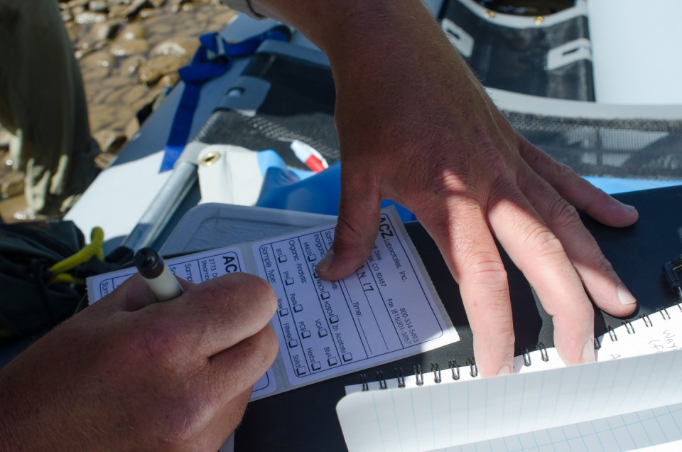 Carefully labeled water samples are taken at points along the Animas River from northern Durango to the southernmost edge of the reservation.