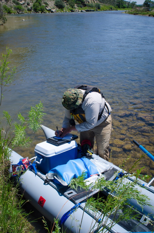 Pete Nylander makes notations with each water sample, recording time of day and corresponding GPS coordinates.