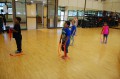 Thumbnail image of Winter Guard participants await instruction during practice