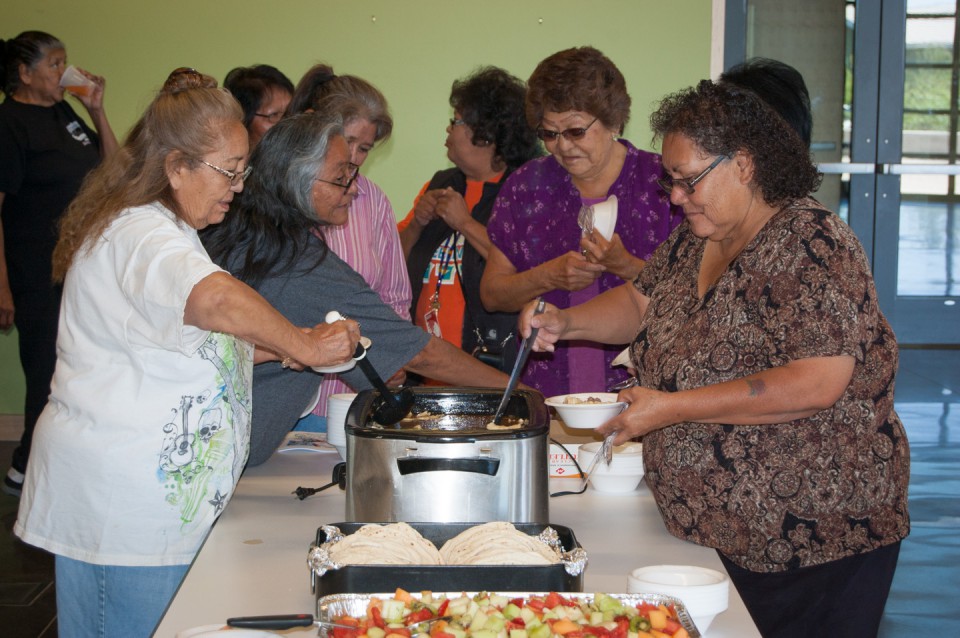 Southern Ute tribal elders line up for a Culture Department luncheon Friday, June 21 at the Southern Ute Cultural Center & Museum. This month’s menu included an egg noodle beef stew with tortillas, fresh fruit and cake.