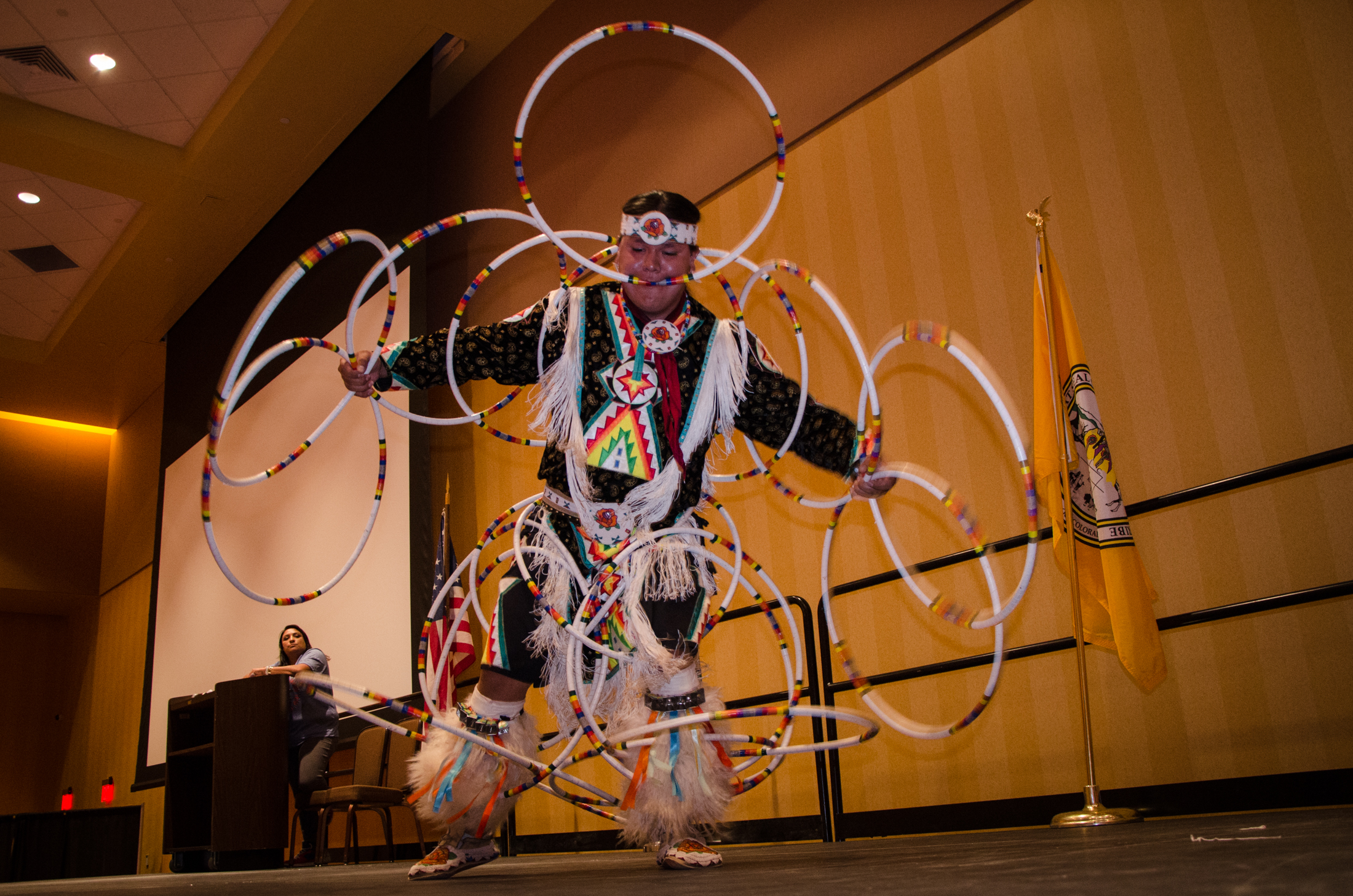 Charles Denny, a former world champion hoop dancer and descendant of the Northern Ute Tribe, performs during the Opening Ceremony.