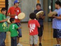 Thumbnail image of Club staffer Nakwihi Perry shares his knowledge of round dance songs with the club kids.