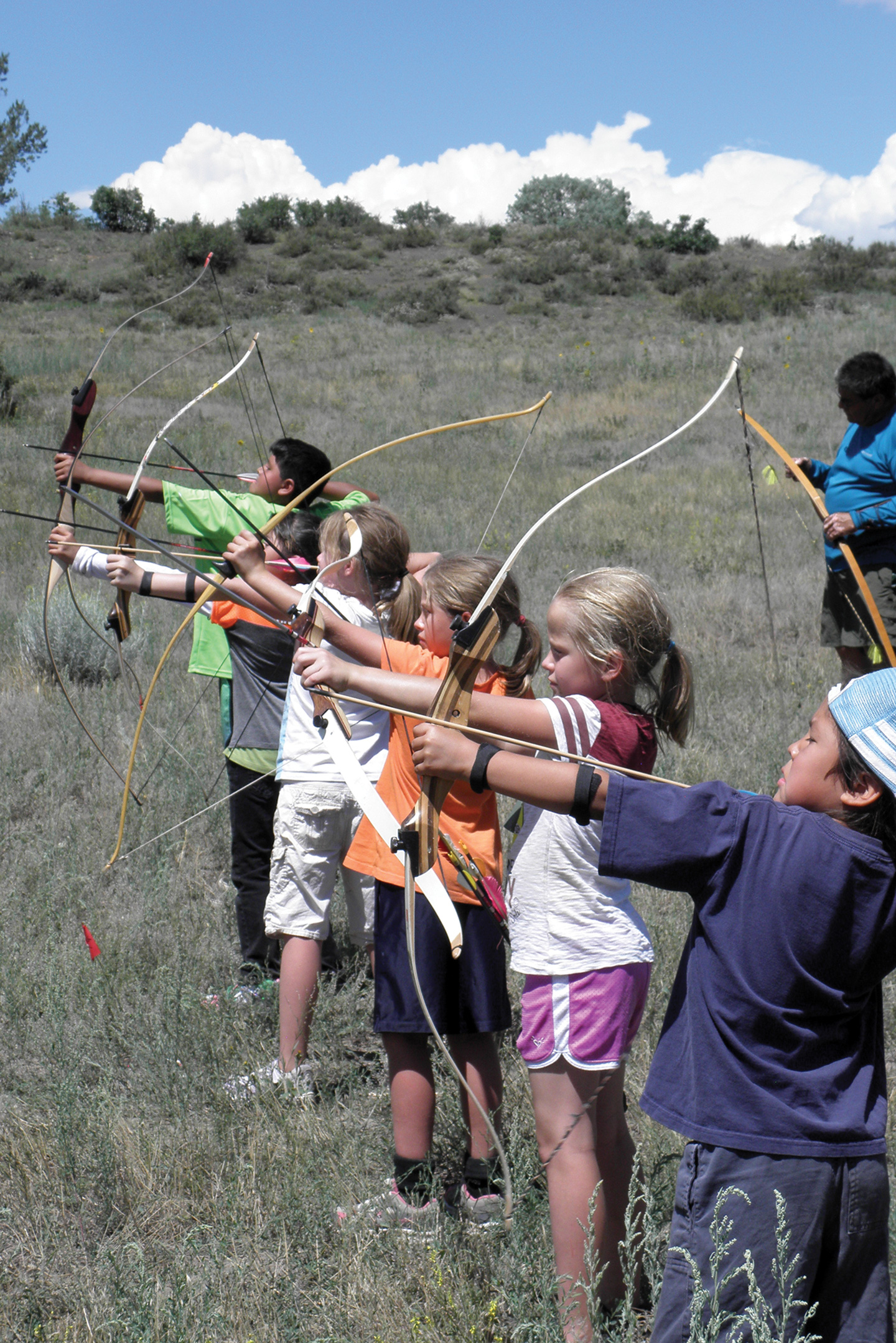 Younger archers draw back