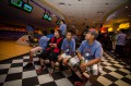 Thumbnail image of Southern Ute bowlers watch the scoreboard.