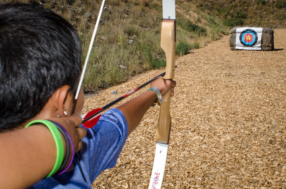 A Southern Ute archer lines up his shot.