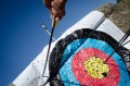 Thumbnail image of Arrows are scored on the range by archers.