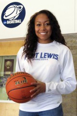 Former three-sport Lady Bobcat Michelle Simmons, now a Fort Lewis College Skyhawk, stands proudly outside Whalen Gymnasium’s doors Thursday, Nov. 7th. Simmons will be spending her first season at FLC as a redshirt, allowing her to build her skills and knowledge of the college-paced hoop game.