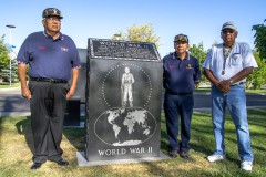 Southern Ute Veterans, Ronnie Baker, Rod Grove, and Howard D. Richards Sr., stand next to the Anthony C. Burch tribute on the 70th anniversary of D-Day, Friday, June 6, in Veterans Memorial Park. The statue is engraved with 43 stars, which represent the tribal members who served during World War II. 