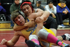 Ignacio 152-pounder Iaasic Pena asserts control over Bloomfield, New Mexico's Jacob Spencer during the weight's championship match at the 2015 Butch Melton Memorial Invitational held inside SunUte Community Center on Saturday, Jan. 31.