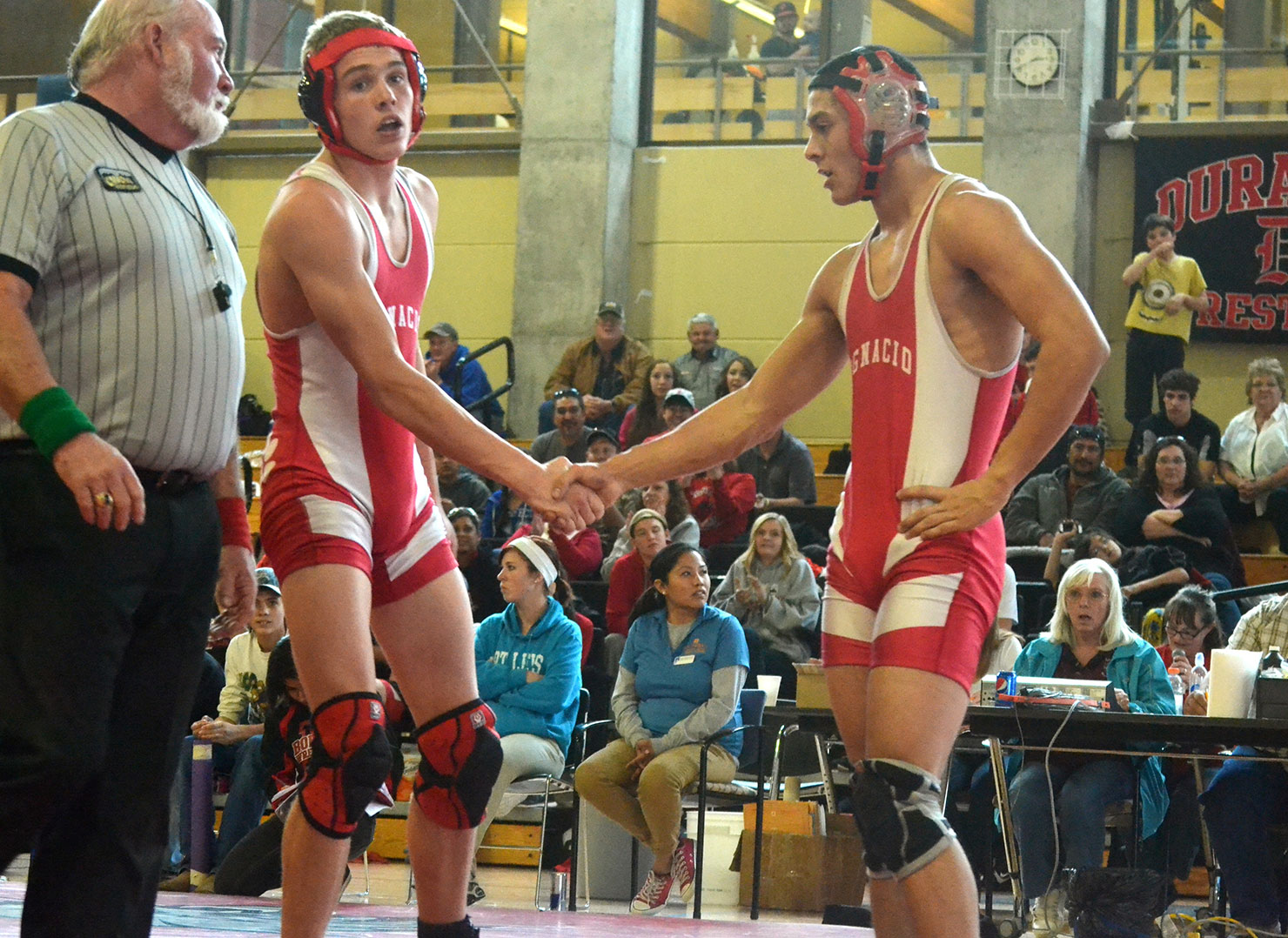 Mike Perez shakes the hand Timmy Plehinger